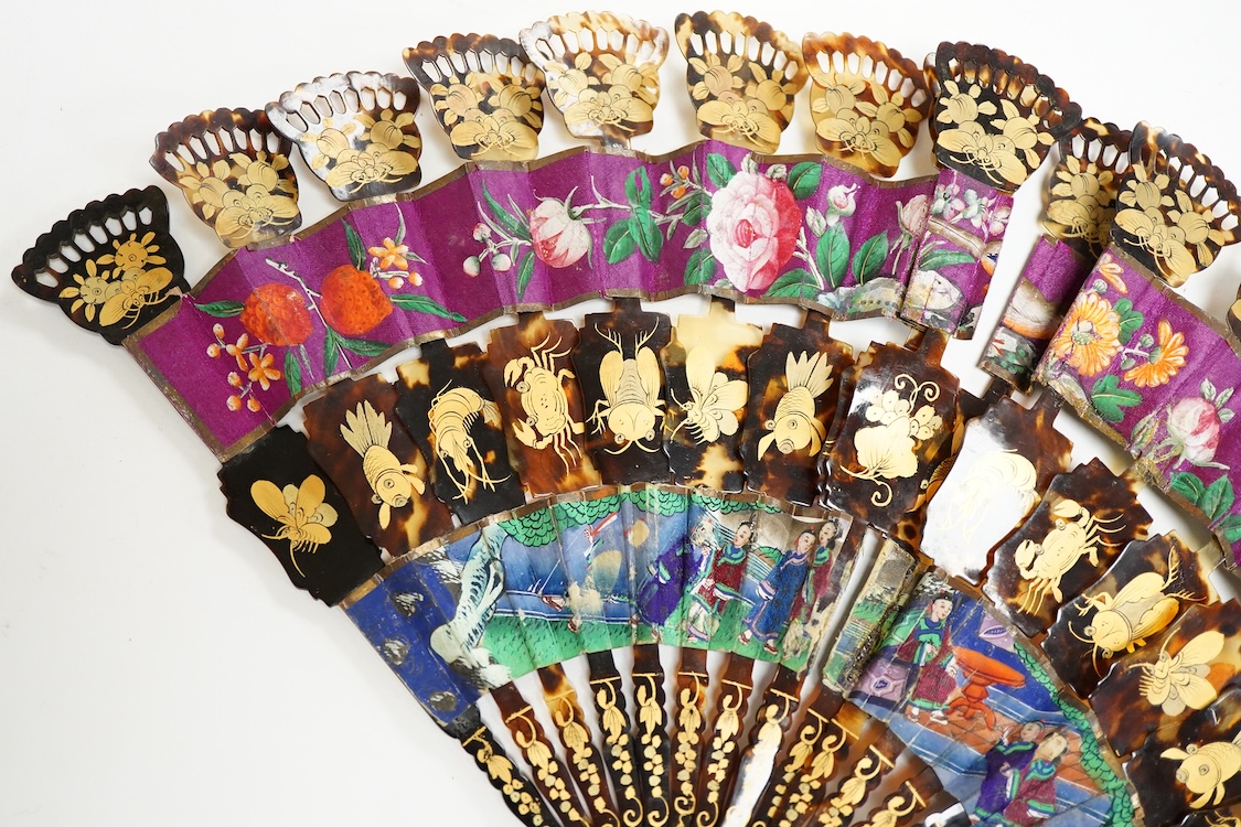 An unusual 19th century Chinese export gilt-decorated tortoiseshell and painted leaf fan, two English fans decorated with paper printed paper crests and a single sided Canton fan leaf lacking sticks, largest 23cm in leng